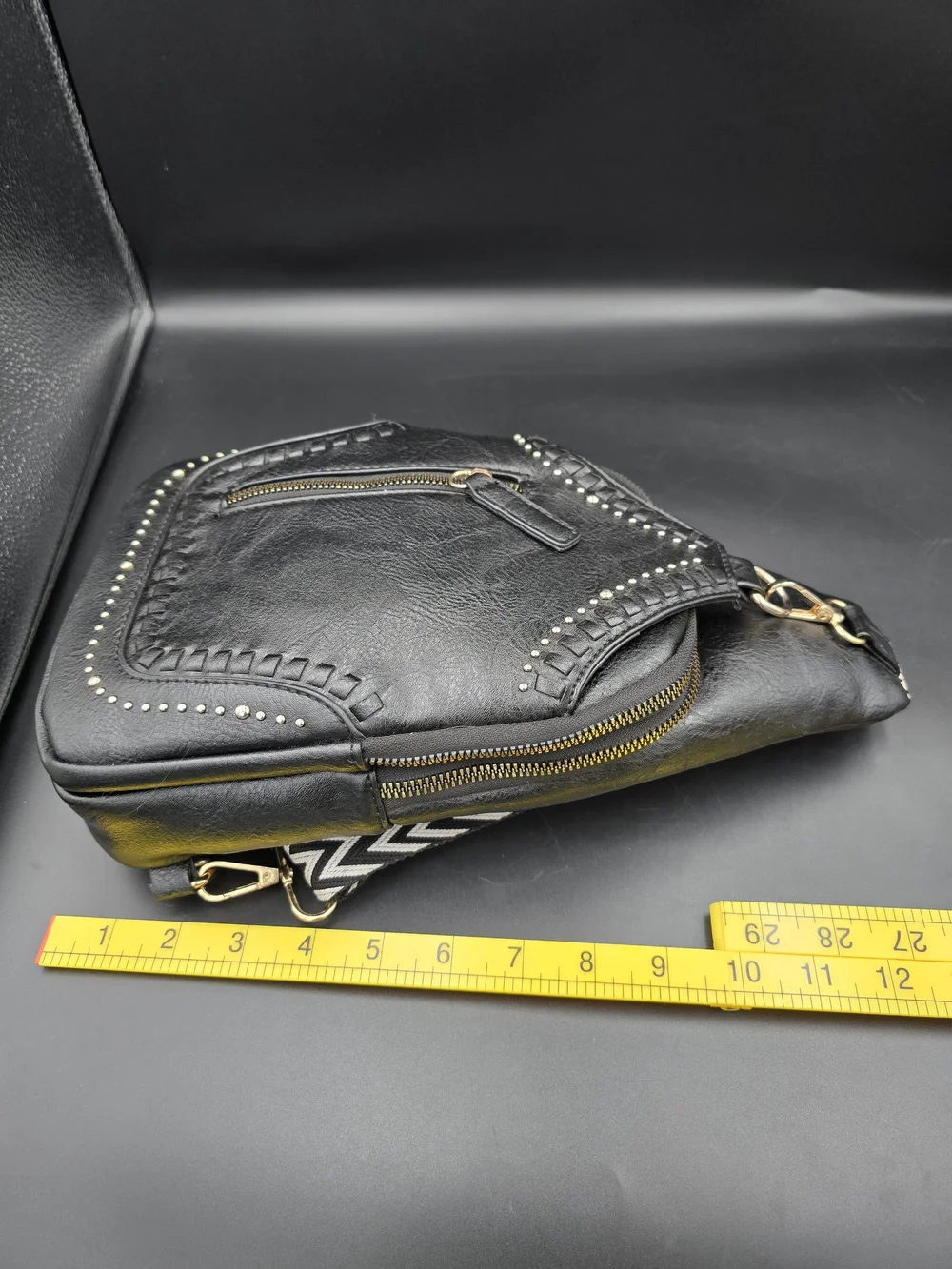 Black Studded Women's Leather Sling Backpack with Patterned Strap